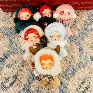 Charming Plush Doll Set with Red and Blue Details